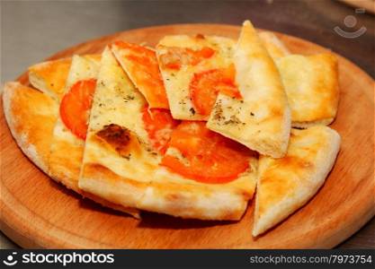 Italian Focaccia bread with tomato and cheese