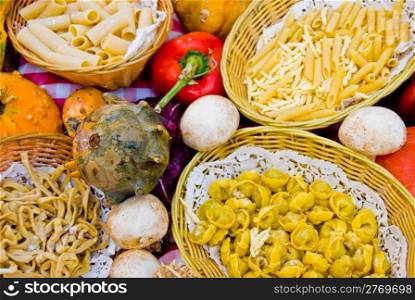 Italian food display. different kinds of food lying nicely decorated on a table