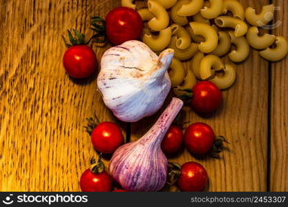 Italian food ingredients on wooden table. Cooking concept