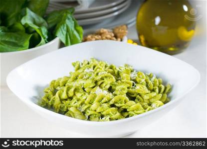 italian fusilli pasta and fresh homemade pesto sauce