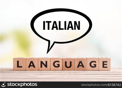 Italian language lesson sign made of cubes on a table