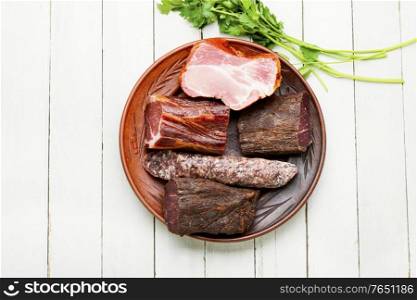 Italian meat platter.Cured meat and sausages.Smoked meat plate. Cured meat platter