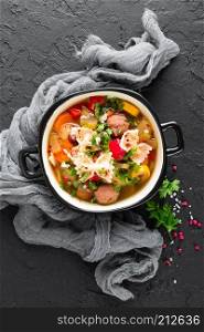 Italian minestrone soup with beef meatballs, vegetables and pasta in bowl. Italian minestrone soup with beef meatballs, vegetables and pasta