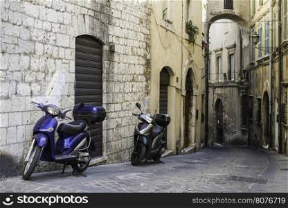 Italian motor scooter in typical italian village