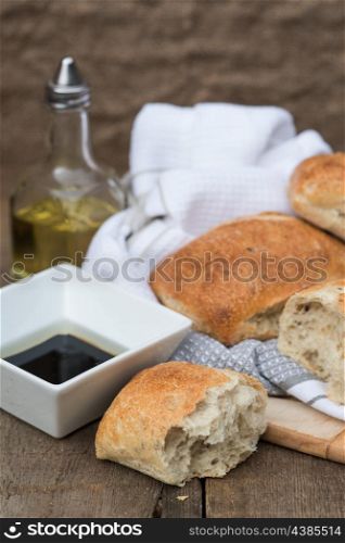Italian olive bread rolls in rustic kiched setting