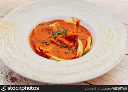 Italian pasta dish with white and tomato sauces