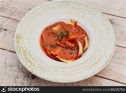 Italian pasta dish with white and tomato sauces