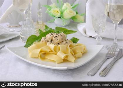 Italian pasta - Pappardelle with chicken fillet in a creamy sauce with sesame seeds