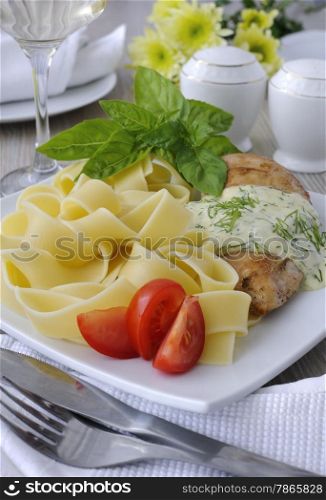 Italian pasta - Pappardelle with chicken in cream sauce and cherry tomatoes