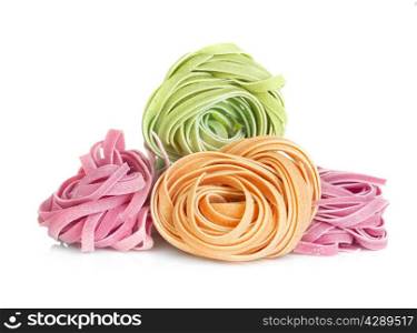 Italian pasta tagliatelle colored isolated on white background