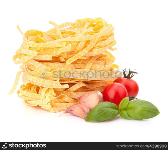 Italian pasta tagliatelle nest and cherry tomato isolated on white background