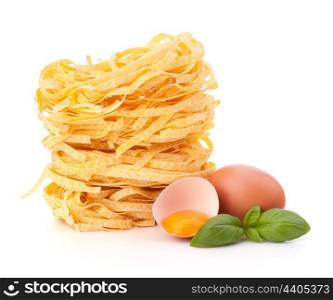 Italian pasta tagliatelle nest isolated on white background