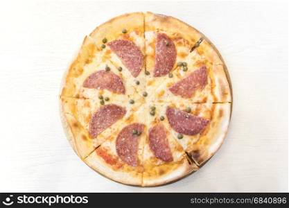 Italian Pepperoni pizza with salami Italian traditional food. Popular street food.