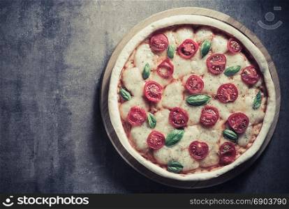 italian pizza at old surface background