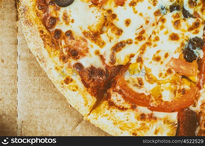 Italian Pizza With Mozzarella, Prosciutto, Tomatoes And Olives