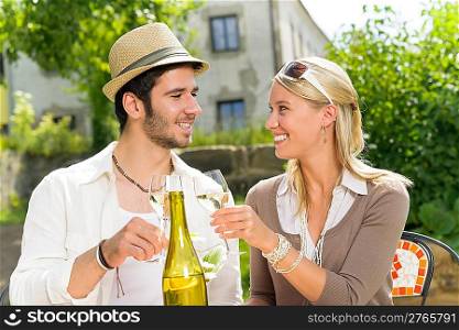 Italian restaurant terrace elegant couple celebrate drink wine summer day