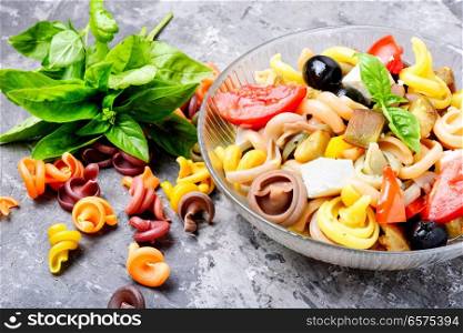 Italian salad with pasta and fried vegetables. Italian Pasta Salad