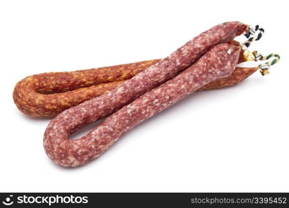 Italian salami sausages closeup on white background