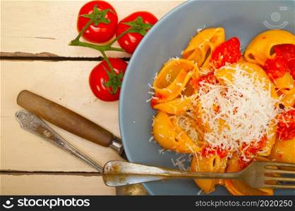 Italian snail lumaconi pasta with ripe cherry tomatoes sauce ingredients