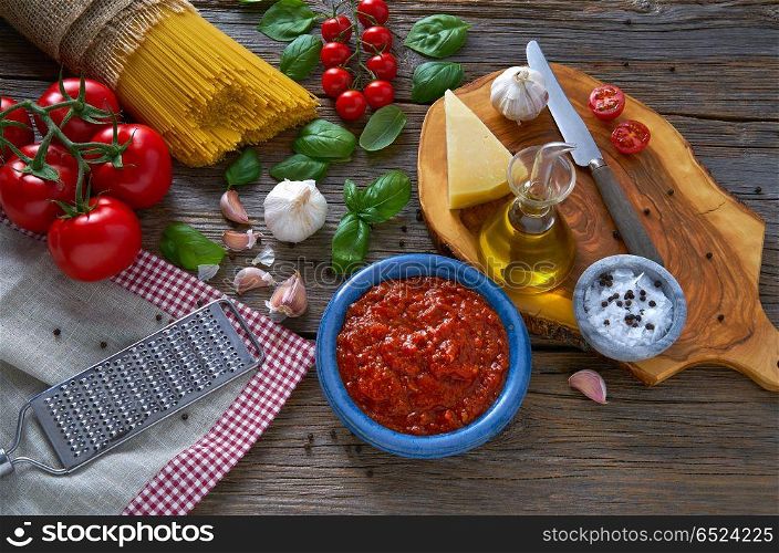 Italian Spaghetti pasta food with cheese tomato garlic basil on wood. Italian Spaghetti pasta cheese tomato garlic basil