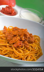 italian spaghetti pasta with fresh homemade tomato and chicken sauce