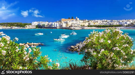 Italian summer holidays- Otranto town in Puglia with crystal turquoise waters