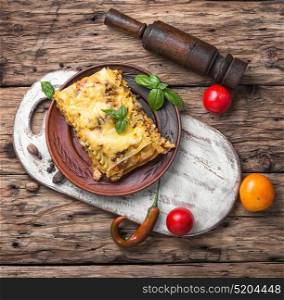 italian traditional lasagna. Traditional Classic italian lasagna on wooden rustic background