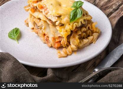 italian traditional lasagna. Traditional italian lasagna on wooden rustic background