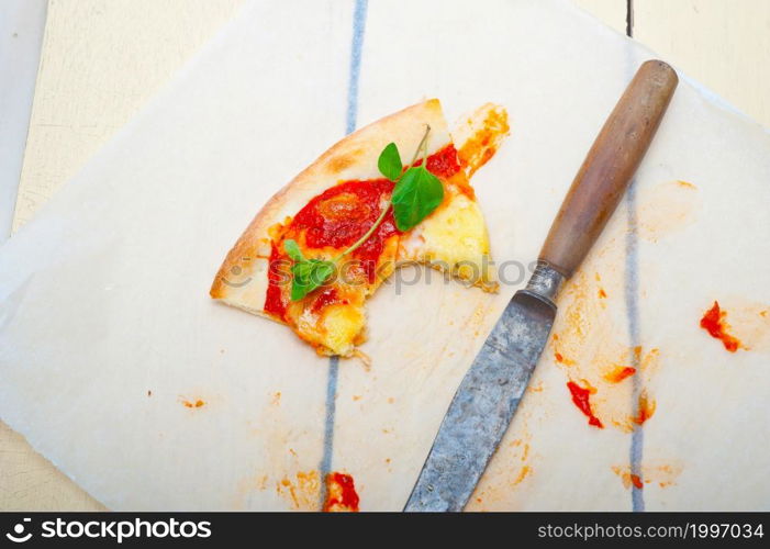 Italian traditional pizza Margherita tomato mozzarella and basil