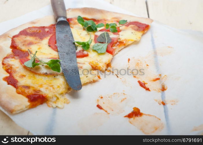 Italian traditional pizza Margherita tomato mozzarella and basil