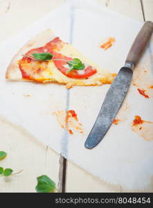 Italian traditional pizza Margherita tomato mozzarella and basil