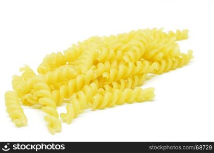 Italian twisted pasta fusilli isolated on white background