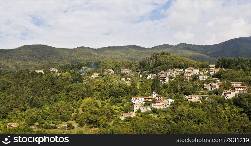 Italian village near the Mediterranean Coast seen from the nearby freeway