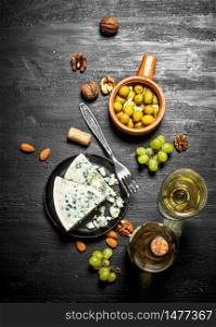 Italian white wine, aromatic cheese and walnuts .. Italian white wine, aromatic cheese and walnuts.