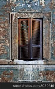 Italian Window with Closed Wooden Shutters in the Rome, Vintage Style Toned Picture