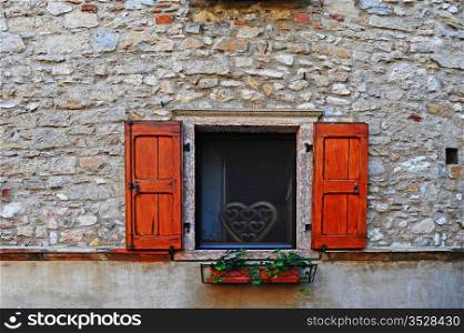 Italian Window With Open Wooden Shutters, Decorated With Fresh Flowers