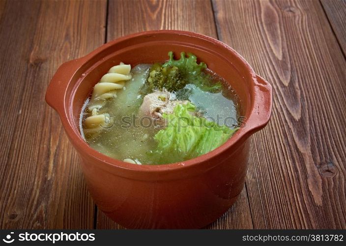 Italian winter soup with pasta, broccoli and meat