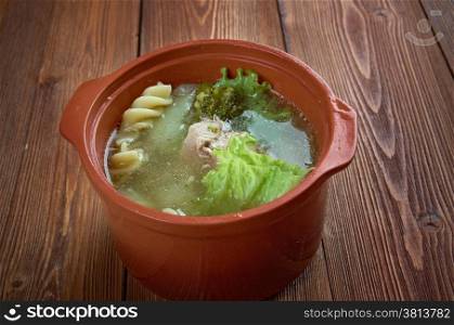 Italian winter soup with pasta, broccoli and meat