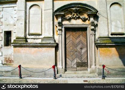 italy church santo antonino varese the old door entrance and mosaic sunny daY
