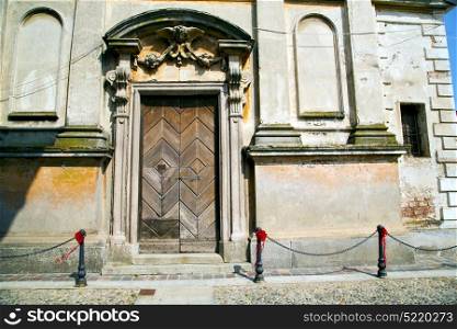 italy church santo antonino varese the old door entrance and mosaic sunny daY