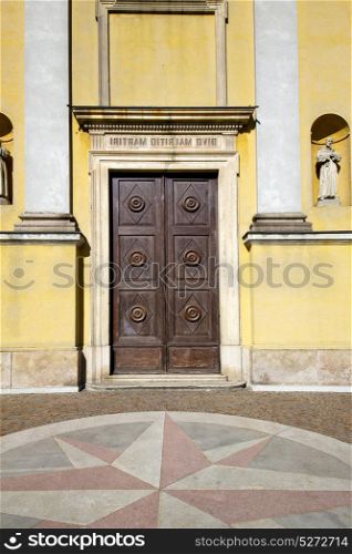 italy church varese the old door entrance and mosaic sunny daY solbiate arno