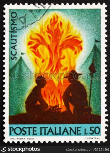 ITALY - CIRCA 1968: a stamp printed in the Italy shows Scouts at Campfire, circa 1968