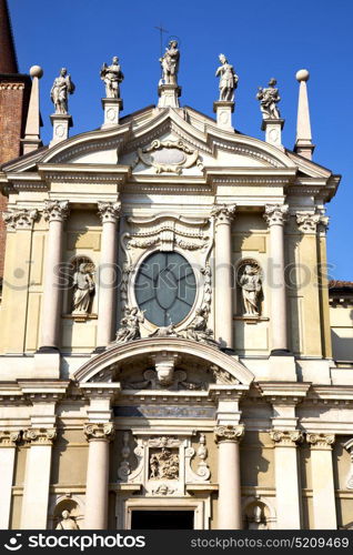 italy lombardy in the busto arsizio old church closed brick tower wall rose window tile abstract