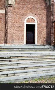 italy lombardy in the cardano al campo old church closed brick tower wall