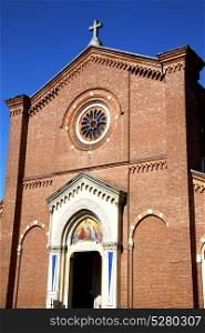 italy lombardy in the castellanza old church closed brick tower wall rose window tile