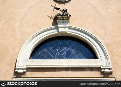 italy lombardy in the jerago old church closed brick tower wall rose window tile