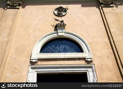 italy lombardy in the jerago old church closed brick tower wall rose window tile