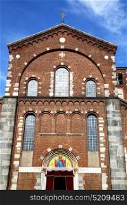 italy lombardy in the legnano old church closed brick tower wall rose window tile