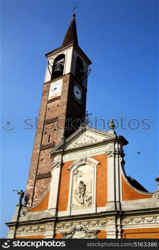 italy lombardy in the mercallo old church closed brick tower wall rose window tile