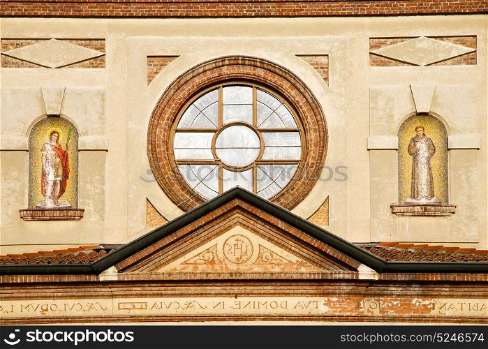 italy lombardy in the parabiago old church closed brick tower wall rose window tile
